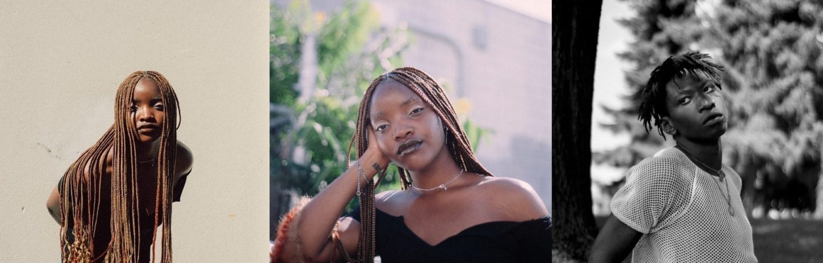 A black and white photo of a woman with dreadlocks.